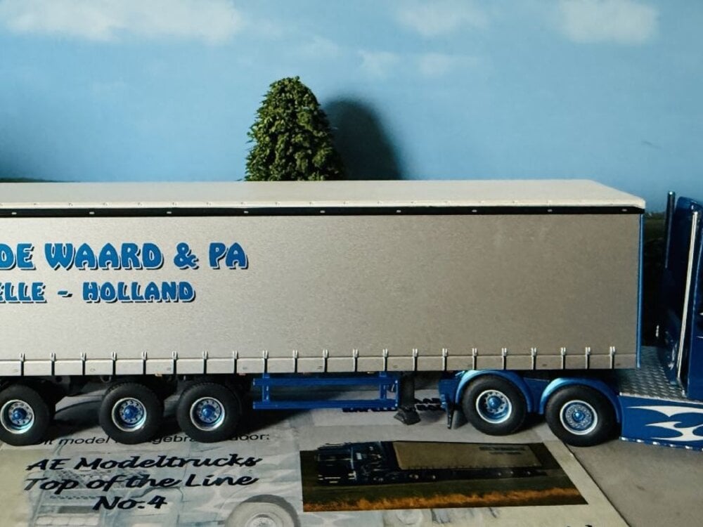 WSI WSI MAN TGX XXL 6X2 with 3-axle curtainside trailer MAURICE DE WAARD