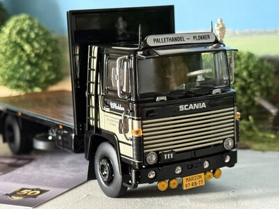 Tekno  Tekno Scania 111 rigid truck with 2-axle flatbed trailer PLOKKER PALLETS