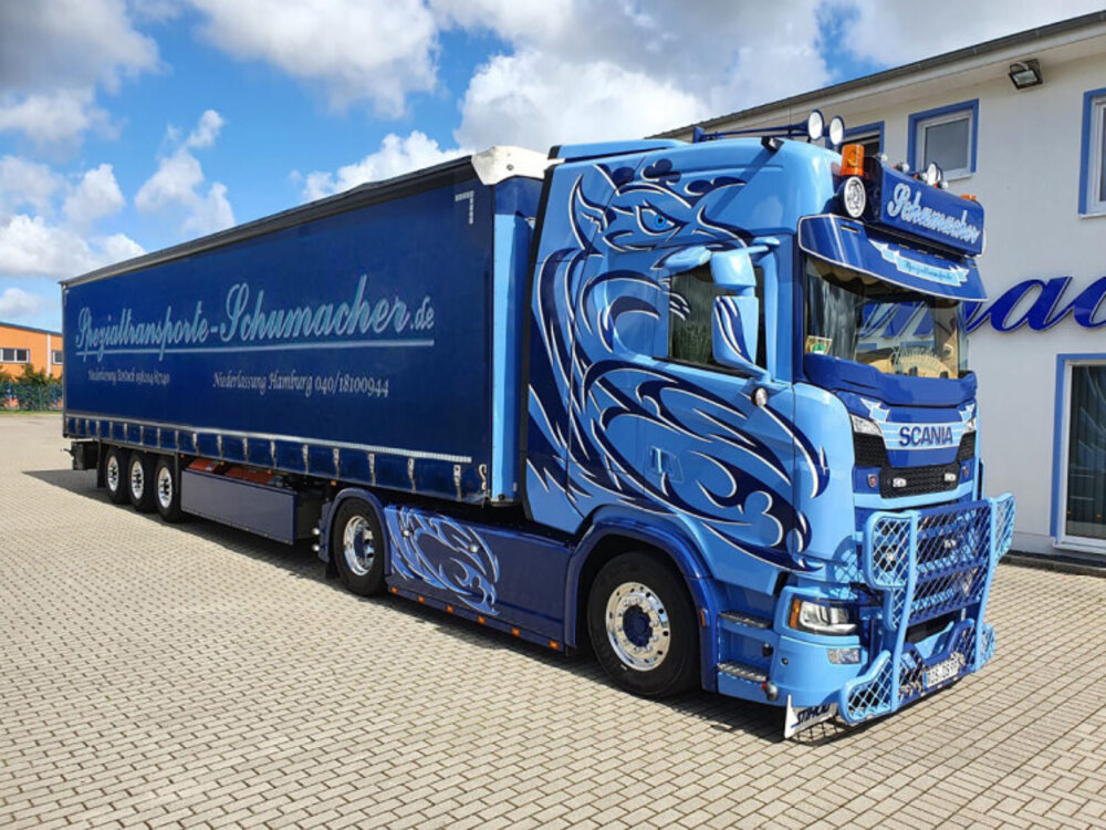 WSI WSI Scania NGS met 3-as schuifzeilen oplegger SCHUMACHER