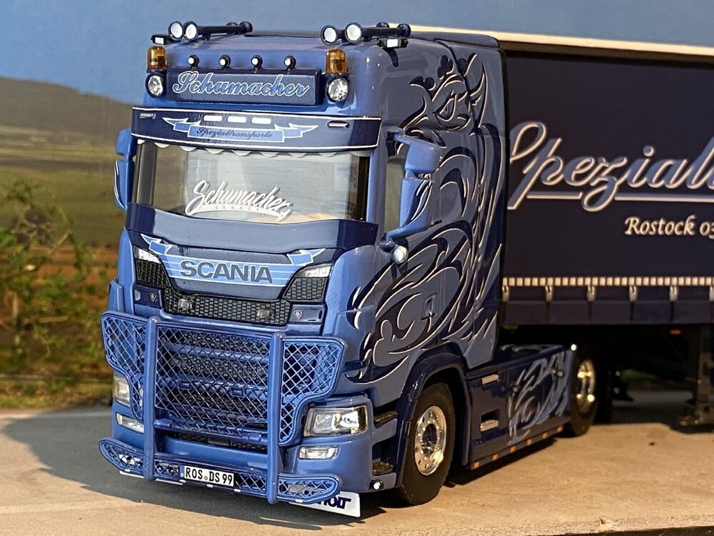 WSI WSI Scania NGS with 3-axle curtainside trailer SCHUMACHER