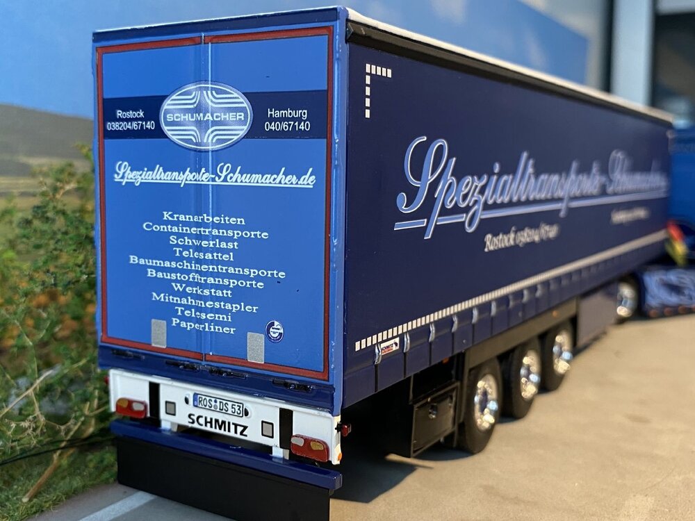 WSI WSI Scania NGS with 3-axle curtainside trailer SCHUMACHER