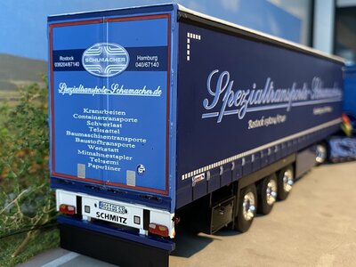 WSI WSI Scania NGS with 3-axle curtainside trailer SCHUMACHER