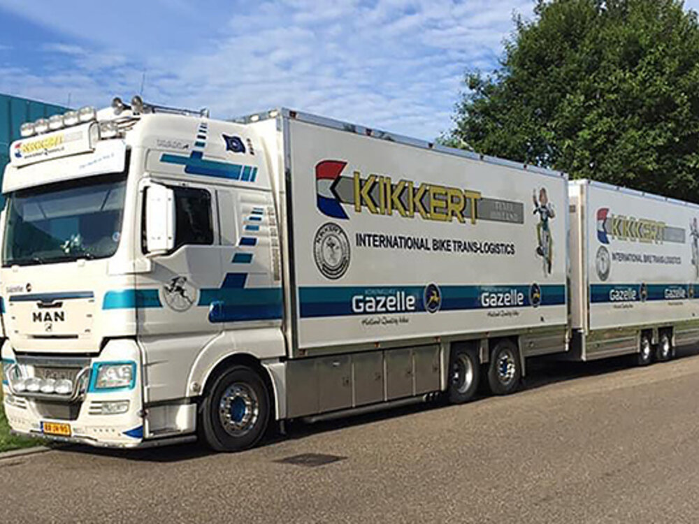 WSI WSI MAN TGX XXL 6x2 bakwagen oplegger 5-as combi KIKKERT VERHUUR