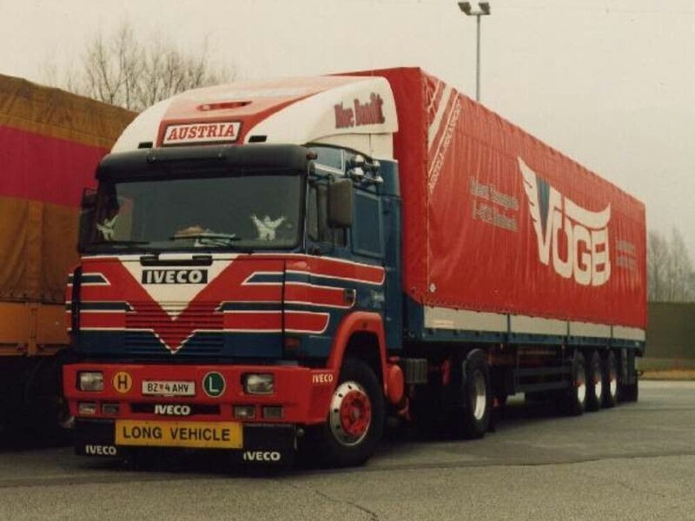 Tekno Tekno Iveco TurboStar 4x2 riged truck with 3-axle tilt trailer VOGEL