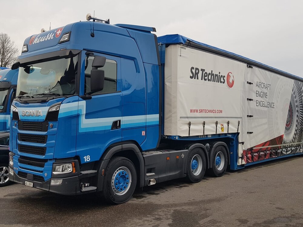 Tekno Tekno Scania S Highline 6x4 wit 2-axle Resin Meusburger lowloader HEUSSI