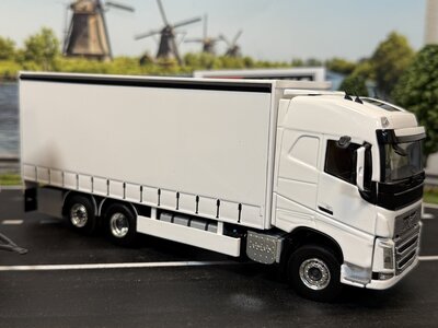 WSI WSI "EXCLUSIVE" Volvo FH4 Glob. 6x2 Rigid truck with curtainside trailer