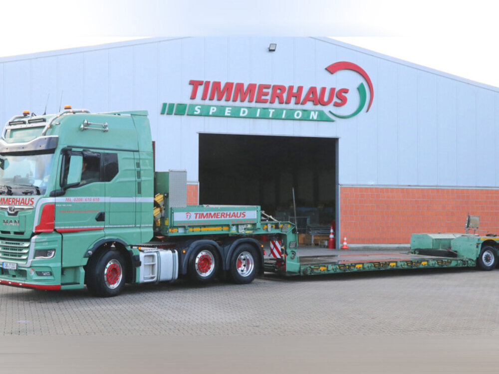 WSI WSI MAN TGX GX 6x2 with 2-axle euro PX Lowloader + wooden box with top seal TIMMERHAUS