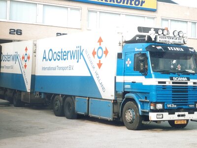 Tekno Tekno Scania 143-420 motorwagen met 2-assige wipkar OOSTERWIJK