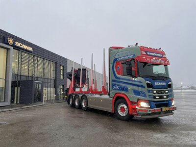 Tekno Tekno Scania NGR Highline 8x4 houtcombi met 4-assige aanhanger JAN HANSEN