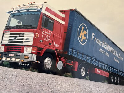 WSI WSI Volvo F16 Globetrotter 4x2 with 3-axle curtainside trailer HENDRICKX & ZONEN