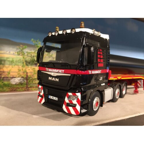 Mammoet store WSI MAN TGX XXL 6x2 + 4-axle lowloader + pipe load MAMMOET
