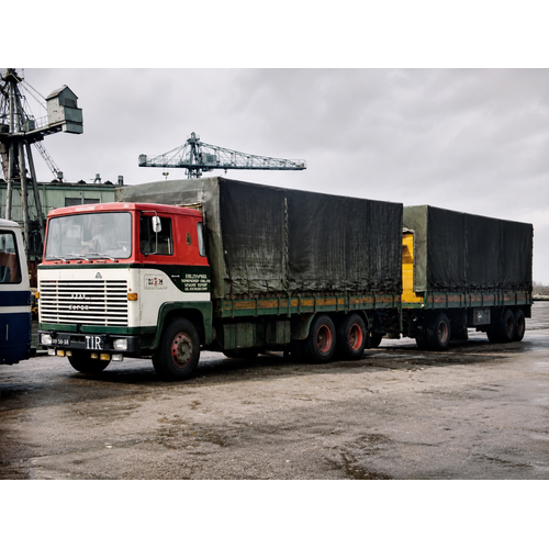 Tekno Tekno Scania 110 Riged truck with tilt trailer DSW