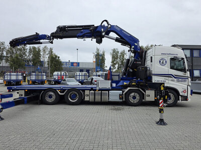 WSI WSI Volvo FH5 Glob. flatbed truck 8x2 + fassi 1100 + jib HELLEROD TRANSPORT