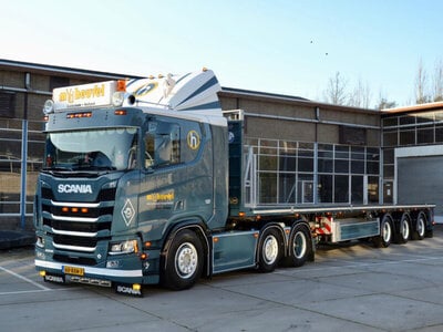 WSI WSI  Scania R flat roof sleeper cab 6x2 with 3-axle flatbed trailer M. VAN DEN HEUVEL