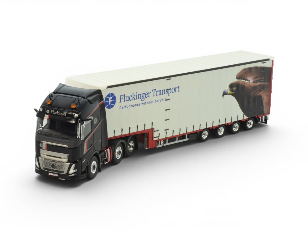 Tekno Tekno Volvo FH Aero Globetrotter XL 6x2 met 4-as Muesburger trailer FLUCKINGER