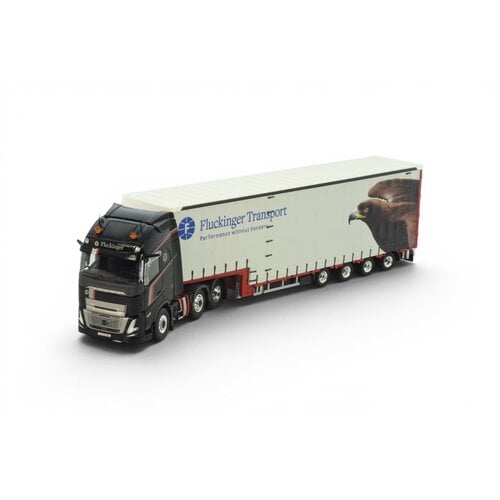 Tekno Tekno Volvo FH Aero Globetrotter XL 6x2 with 4-axle Muesburger trailer FLUCKINGER