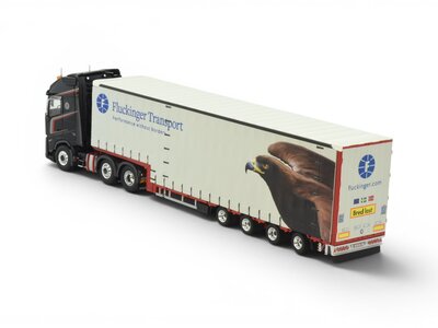 Tekno Tekno Volvo FH Aero Globetrotter XL 6x2 met 4-as Muesburger trailer FLUCKINGER