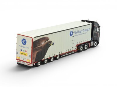 Tekno Tekno Volvo FH Aero Globetrotter XL 6x2 met 4-as Muesburger trailer FLUCKINGER