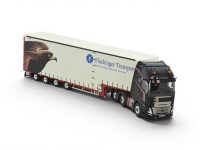 Tekno Tekno Volvo FH Aero Globetrotter XL 6x2 met 4-as Muesburger trailer FLUCKINGER