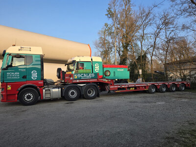 WSI WSI MAN TGX GM 6x2 met 4-assige dieplader SCALES