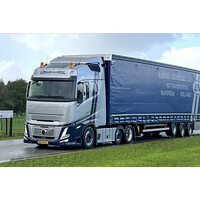 WSI Volvo FH Aero Globetrotter 6x2 with 3-axle curtainside trailer LOHUIS NIJVERDAL