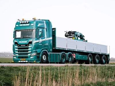 Tekno Tekno Scania NGS Highline 6x4 trekker met 3-assige steenoplegger G.L. DE HAAN