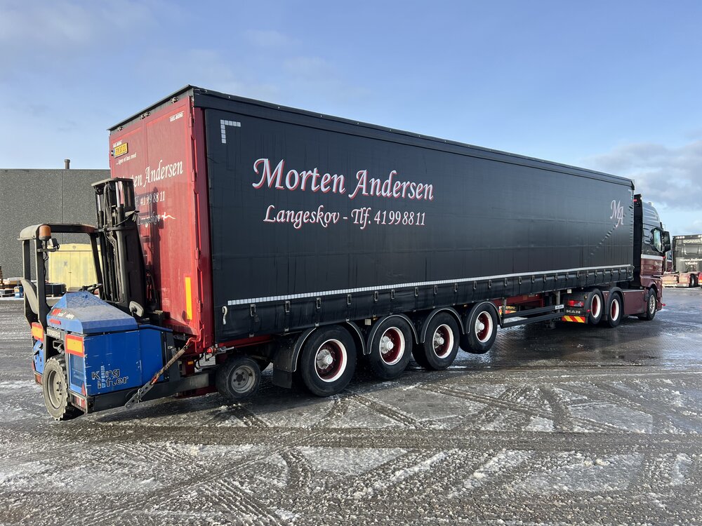 Tekno Tekno MAN TGX GX met 4-assige schuifzeiloplegger en Terberg kooiaap MORTEN ANDERSEN