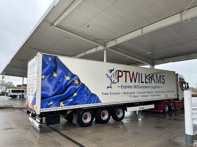 WSI WSI Scania S590 6x2 + 3-axle box trailer P.T. WILLIAMS Wales England