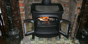 Wat is een houtkachel met hoog rendement?