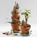 Terracotta bloempot, 4,2 cm. hoog  5cm. doorsnee, 1 st.