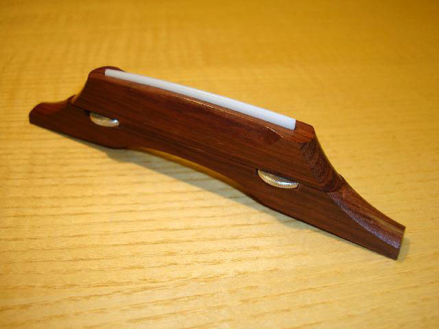 Rosewood Jazz Guitar bridge with plastic saddle