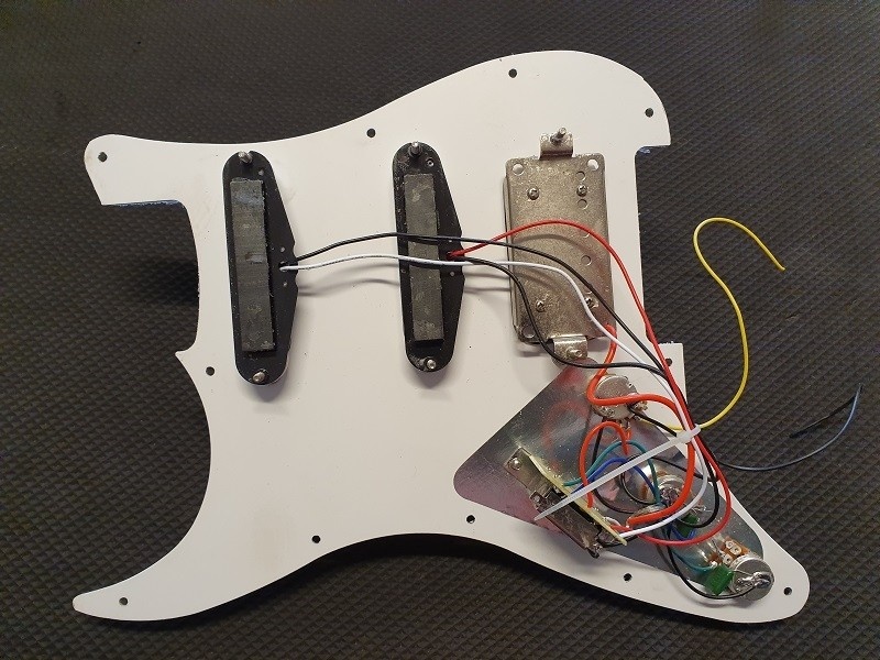 Tonedriver Strat HSS loaded prewired pickguard pearl white