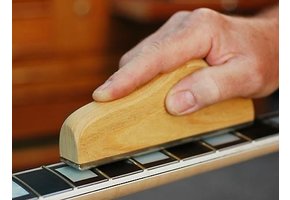 Fret leveler with handle