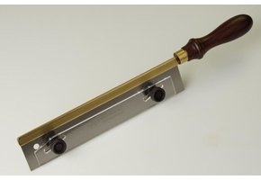 Fret slotting saw with depth stop