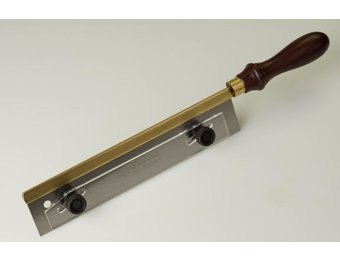 Fret slotting saw with depth stop