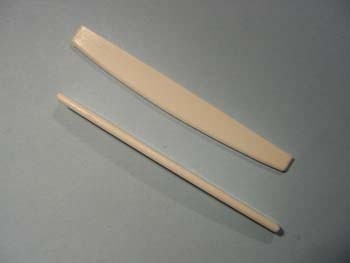 Acoustic steel string guitar bridge saddle plastic