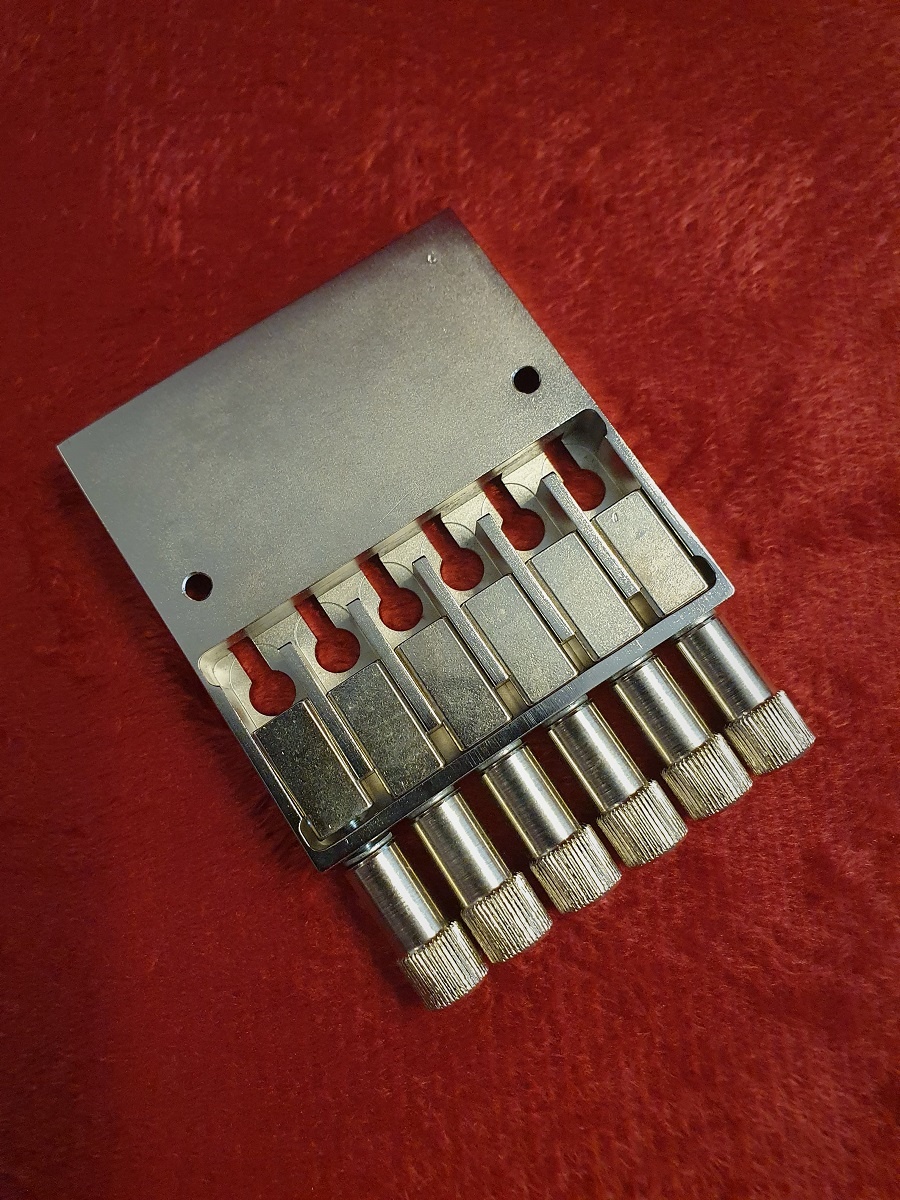 True Tone headless guitar bridge nickel