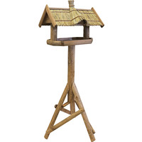 Voederhuis bruin stulp met stro dak.