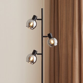Moderna lampada da terra Mesa a 3 luci, nero opaco con vetro grigio fumé