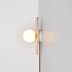 Applique Ketris in travertino con sfera di vetro