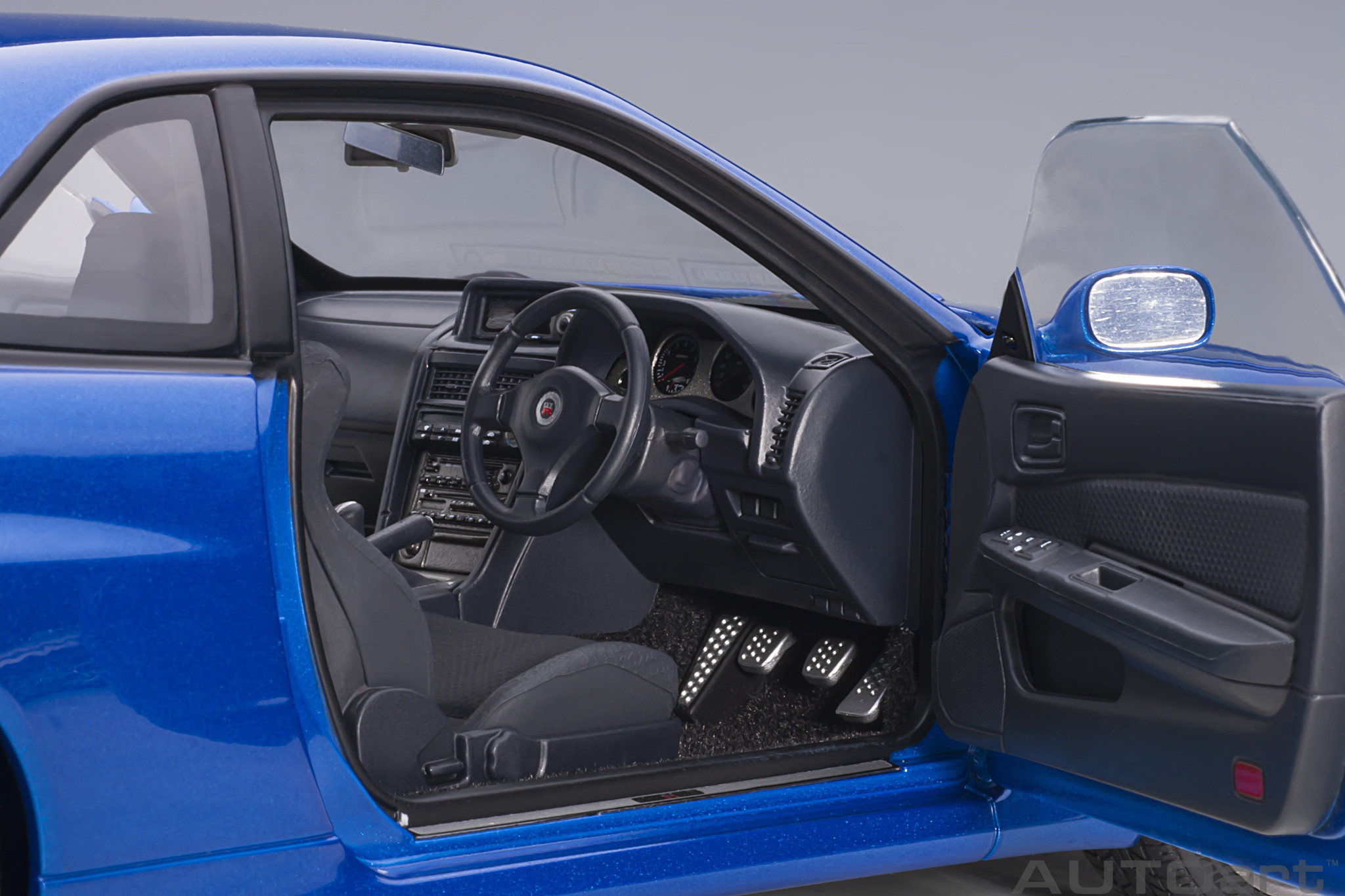 1:18 Nissan Skyline GT-R (R34) V-Spec II Bayside Blue Autoart