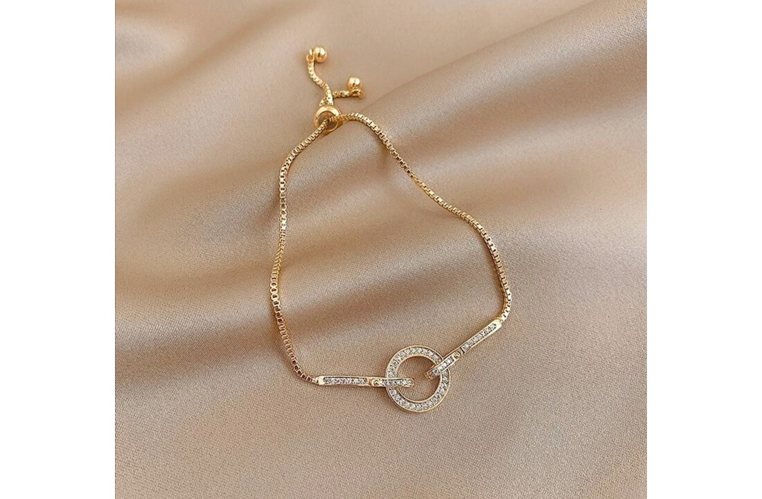 Goudkleurige armband met steentjes