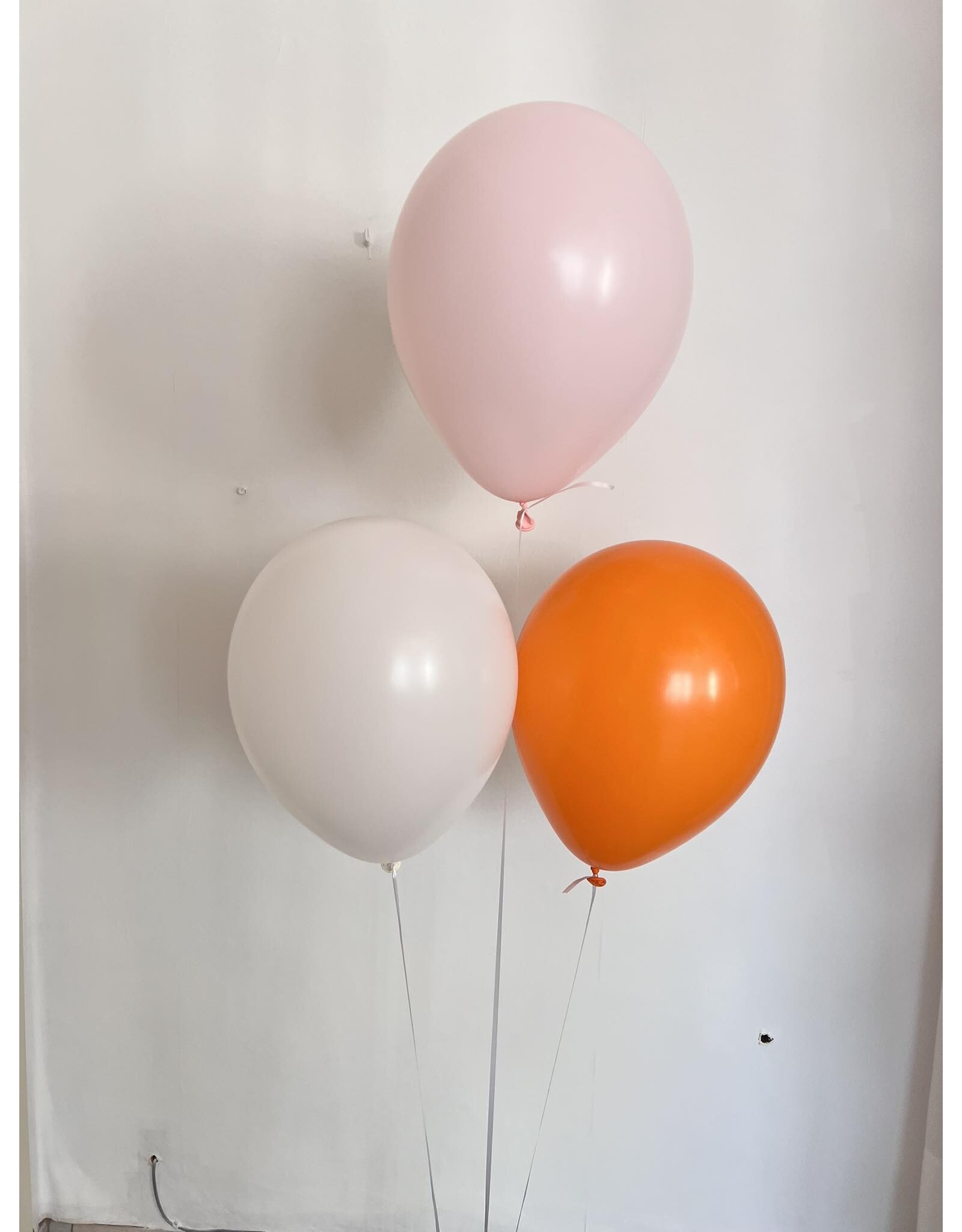 Ballonnentros gevuld met helium: Pastel roze, wit, oranje