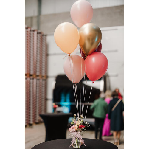 Ballondecoratie met naamslinger voor een kinderfeestje