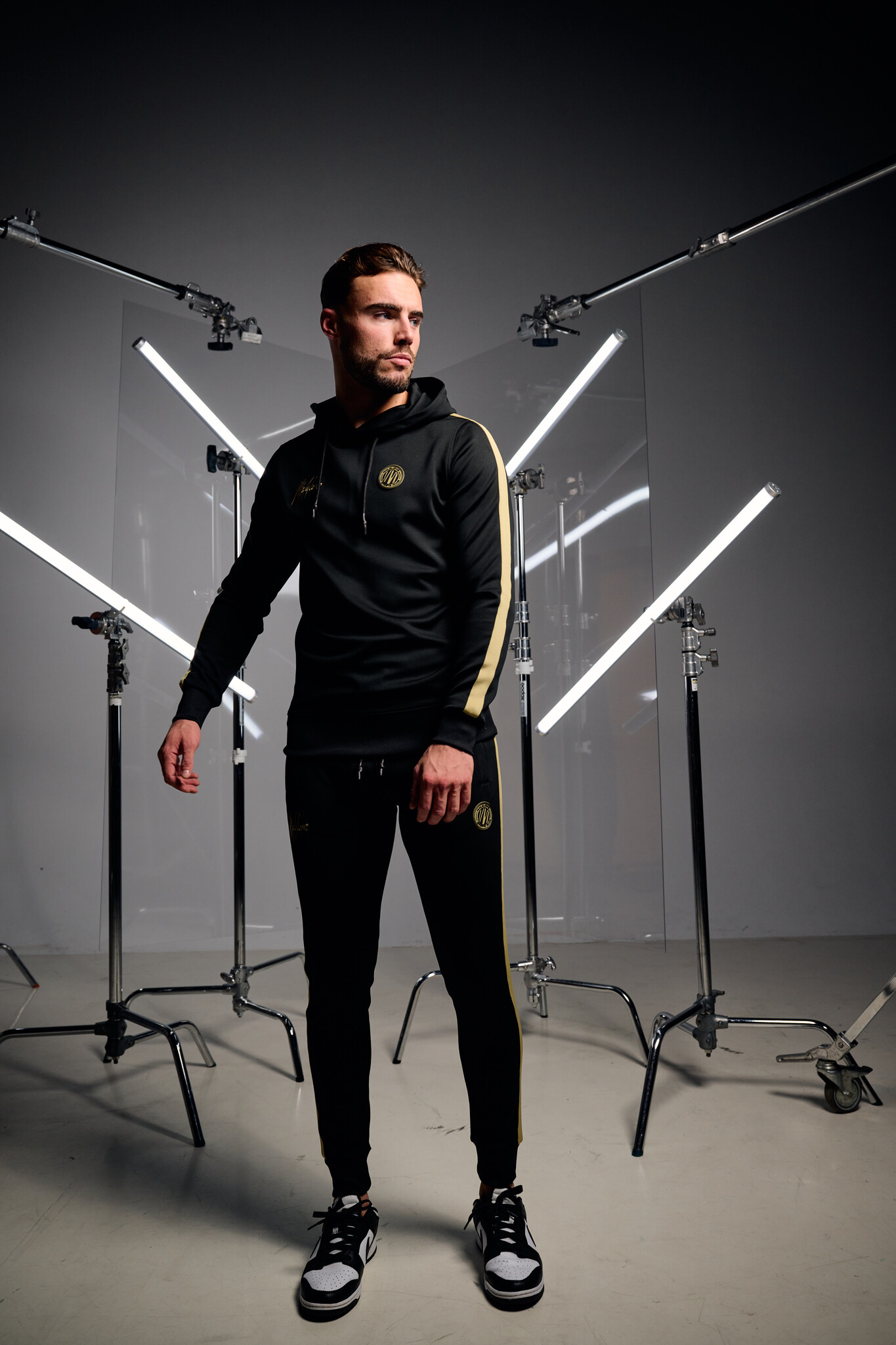 Black and gold tracksuit hotsell