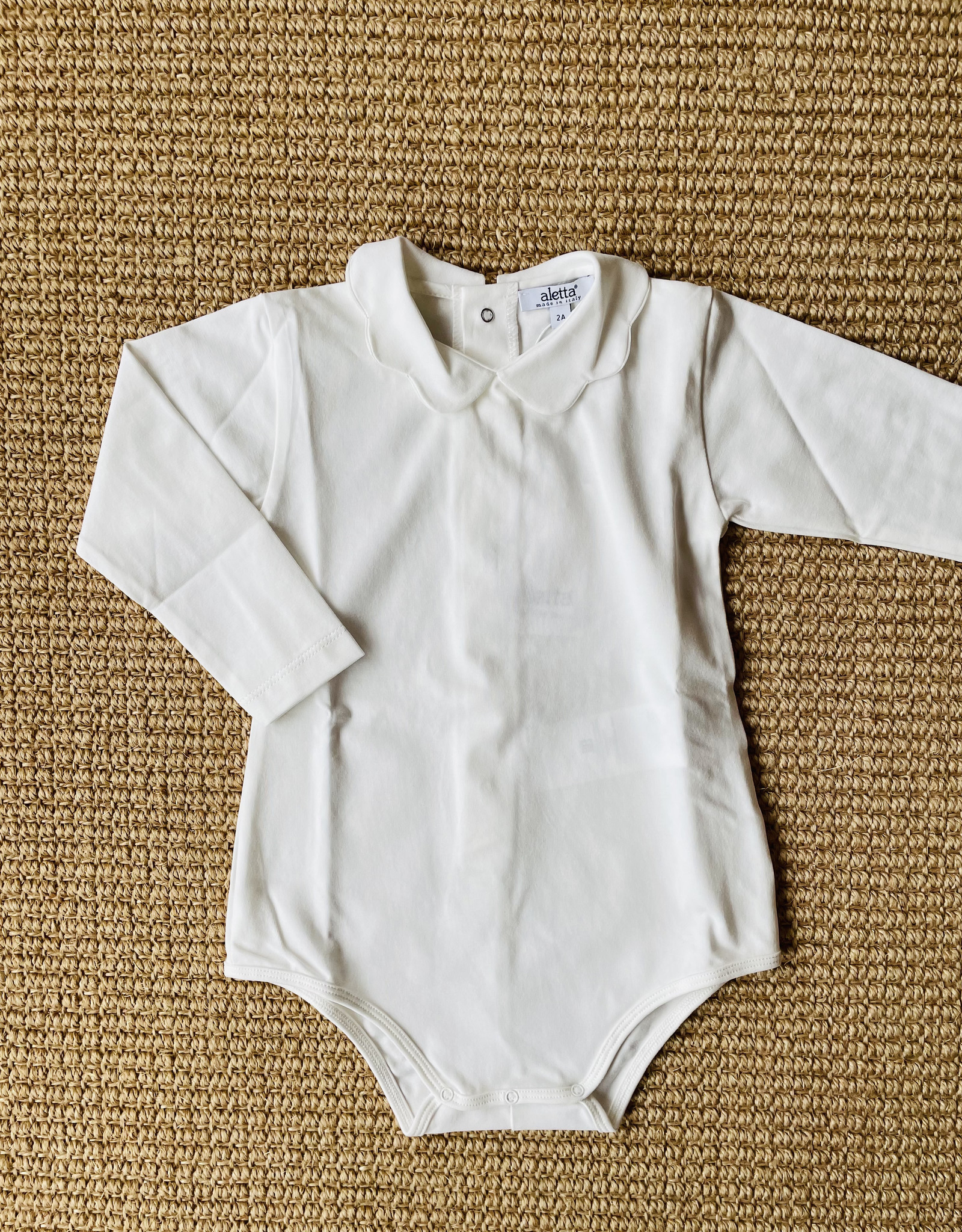 Aletta / Body met lange mouwen en golvende kraag