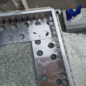 Versandmetall Grindkeringsprofiel grindprofiel klein geperforeerd roestvrij Staal 1.4301 gezet 90°