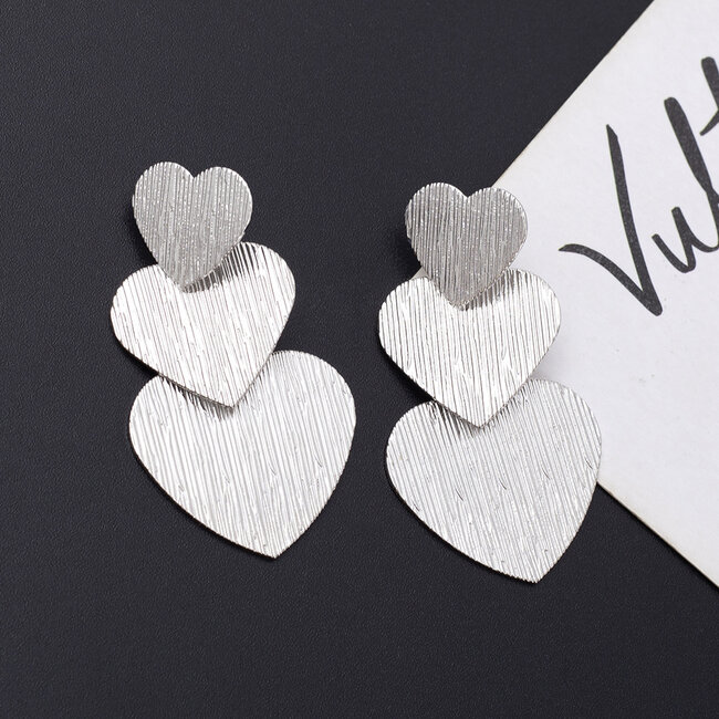Three Heart Oorbellen | Zilverkleurig | 4,9 cm x 2,7 cm | Fashion Favorite