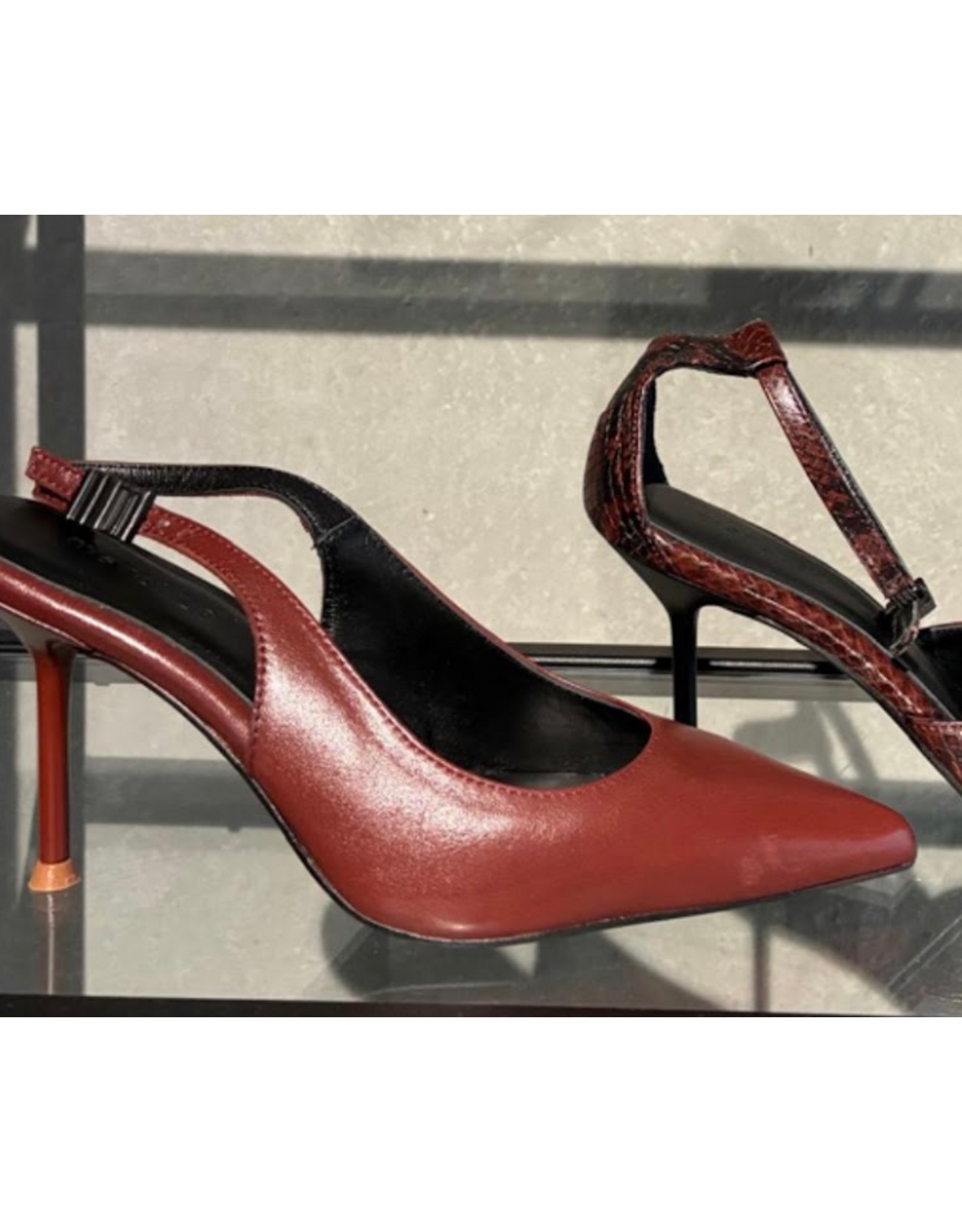 MARCH23 ROSE SLINGBACK