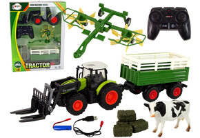 Bestuurbare trekker - RC - met hooi en koe beeldje - groen